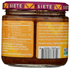 Siete Salsa Taqueria Soleada open bottle ready to pour over toppings.