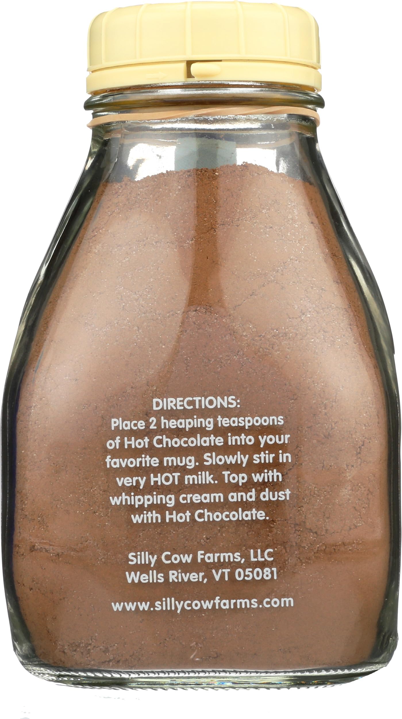 Silly Cow Farms Marshmallow Swirl being poured into a mug.
