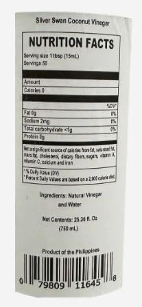 Silver Swan Coconut Vinegar label close-up, highlighting 750ml size and natural acidity for dressings.