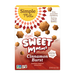 Simple Mills Cookie Cinnamon Burst pack on a rustic board, gluten-free snack option.