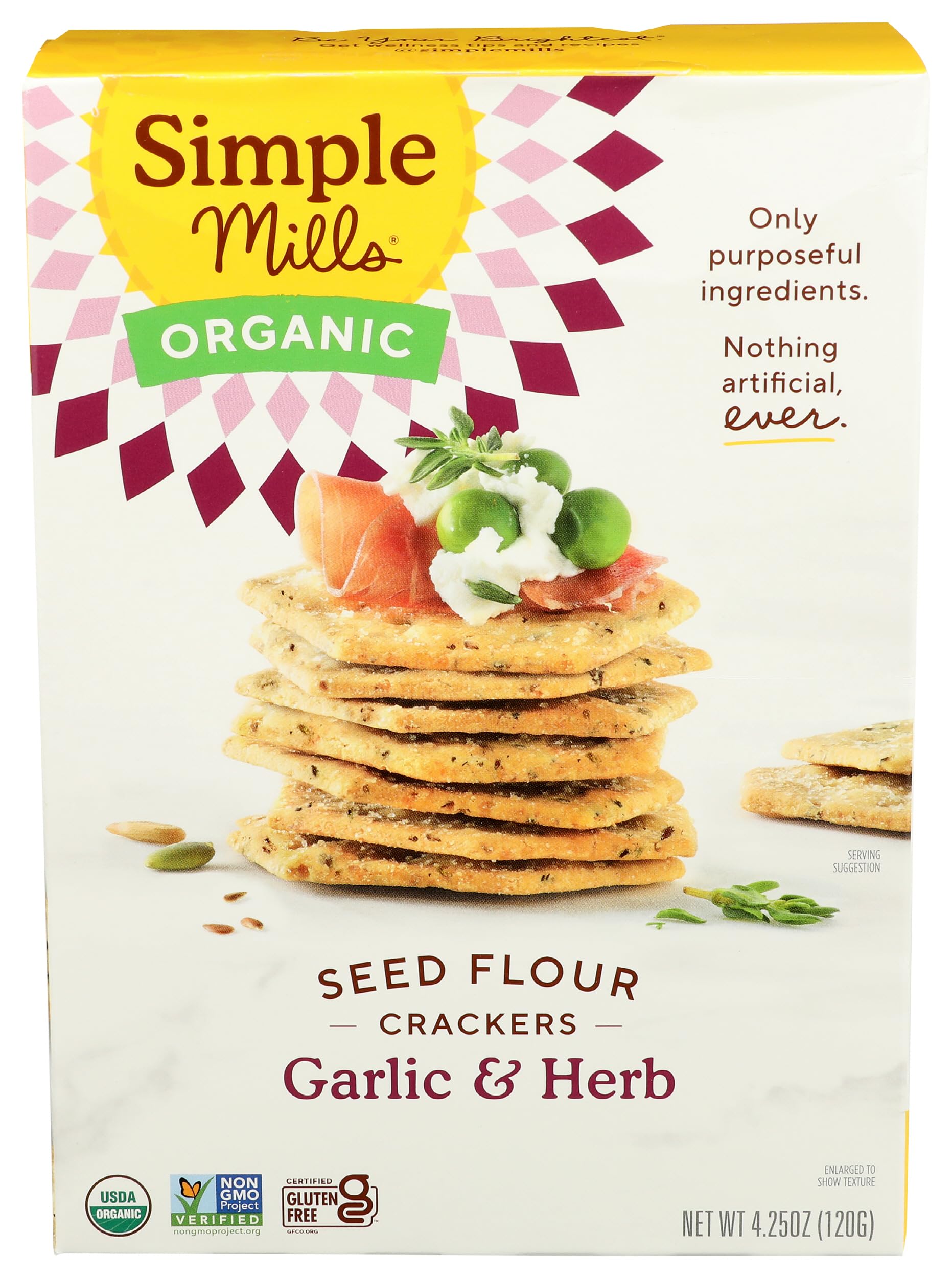 Simple Mills Cracker Seed Garlic Herb box on kitchen counter for quick snacking.