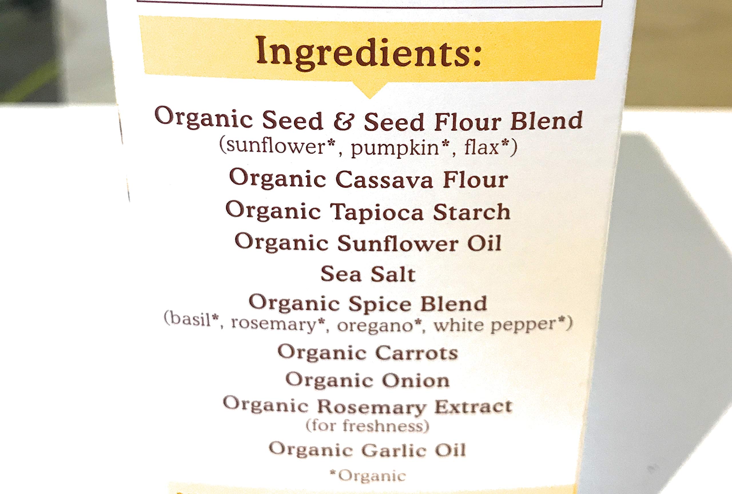 Packaging shot of Simple Mills Cracker Seed Garlic Herb, highlighting premium ingredients.