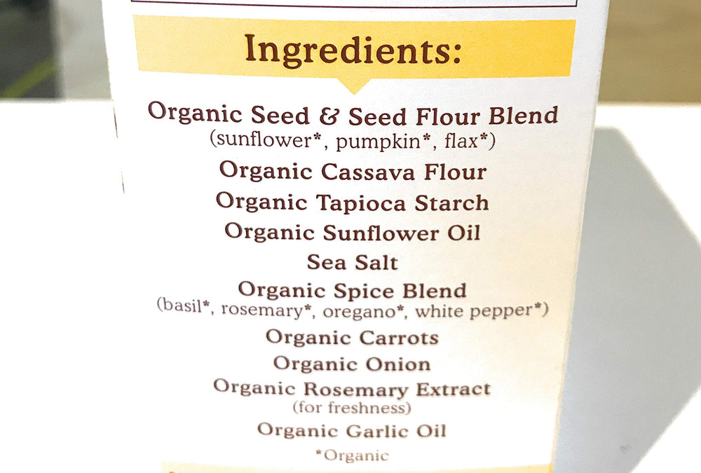 Packaging shot of Simple Mills Cracker Seed Garlic Herb, highlighting premium ingredients.