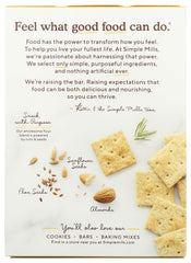 Simple Mills Crckr Almond Flour Rosemary Salt crackers beside a dipping bowl of hummus