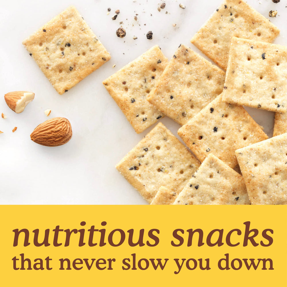 Simple Mills cracker paired with cheddar cheese for appetizing bite