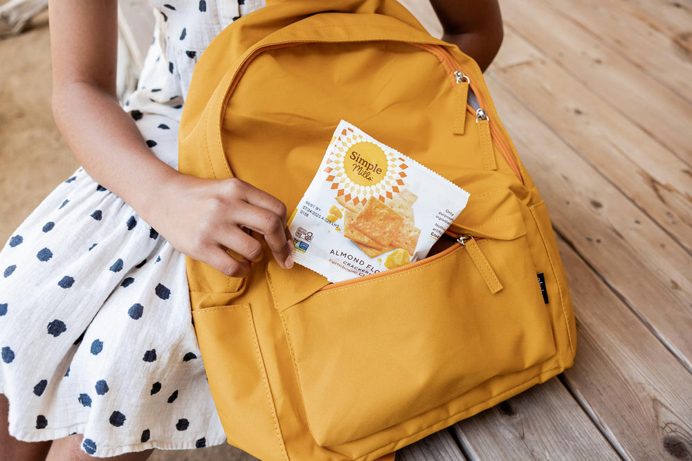 Packaging shows gluten-free and non-GMO focus for trust.