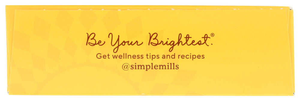 Pouring batter from Simple Mills Cocoa Pancake Waffle Mix for fluffy, tasty pancakes.