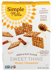 Simple Mills Sweet Thins Honey Cinnamn packaging on a clean surface, a premium pantry staple for quick snacking.