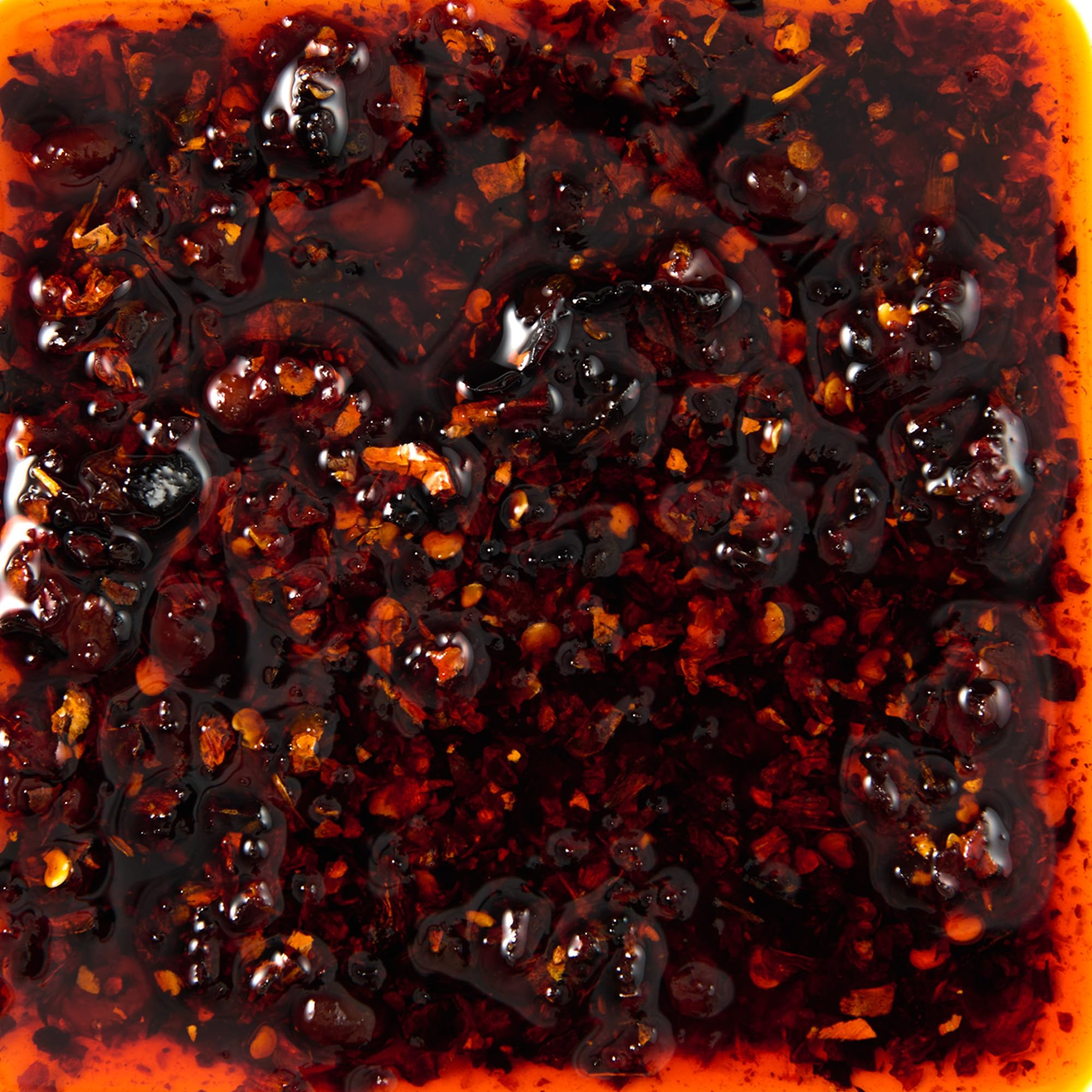 Simply Asia Chili Crunch Sauce jar close-up shows convenient squeeze and texture.