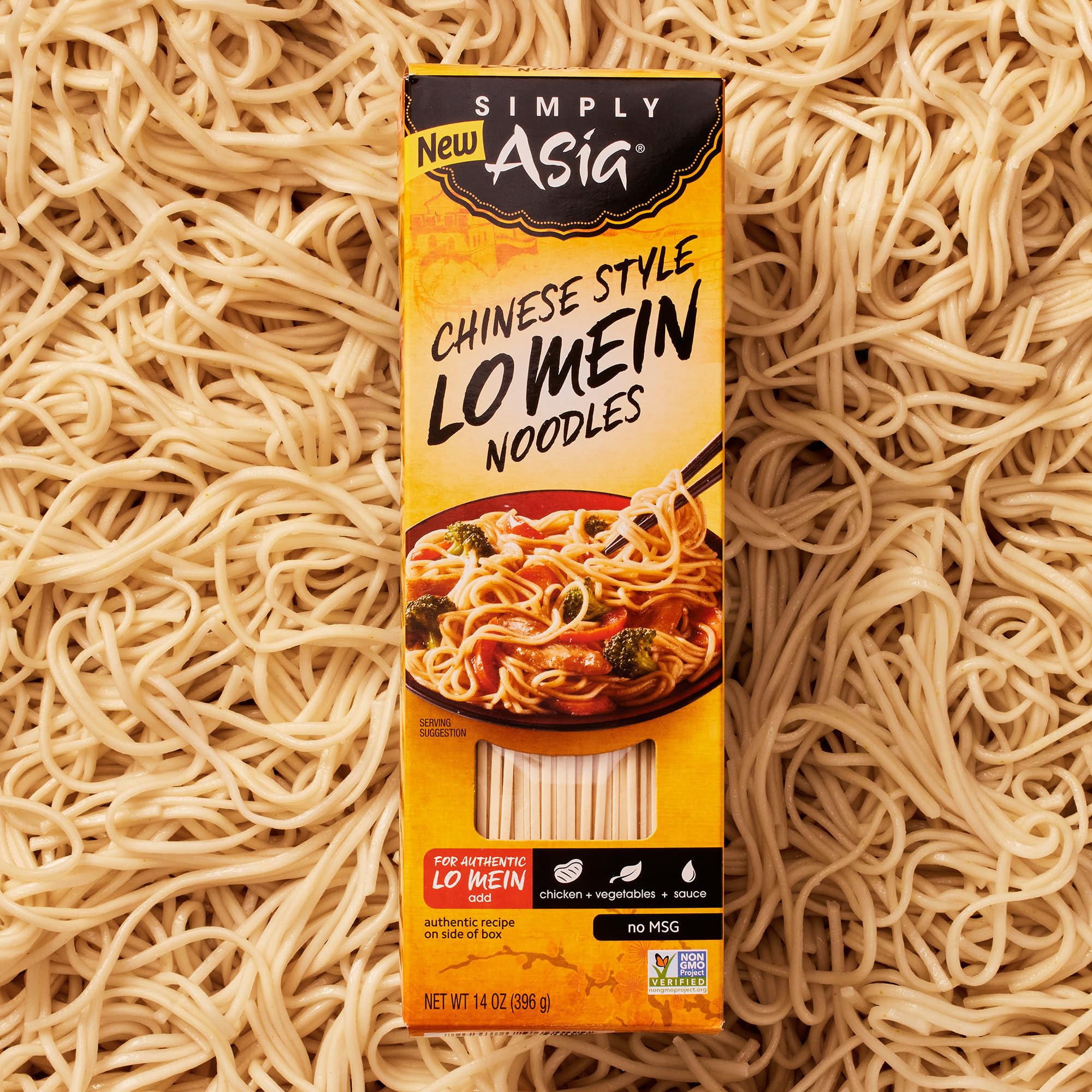Busy kitchen scene with Simply Asia Lo Mein noodles on the stove