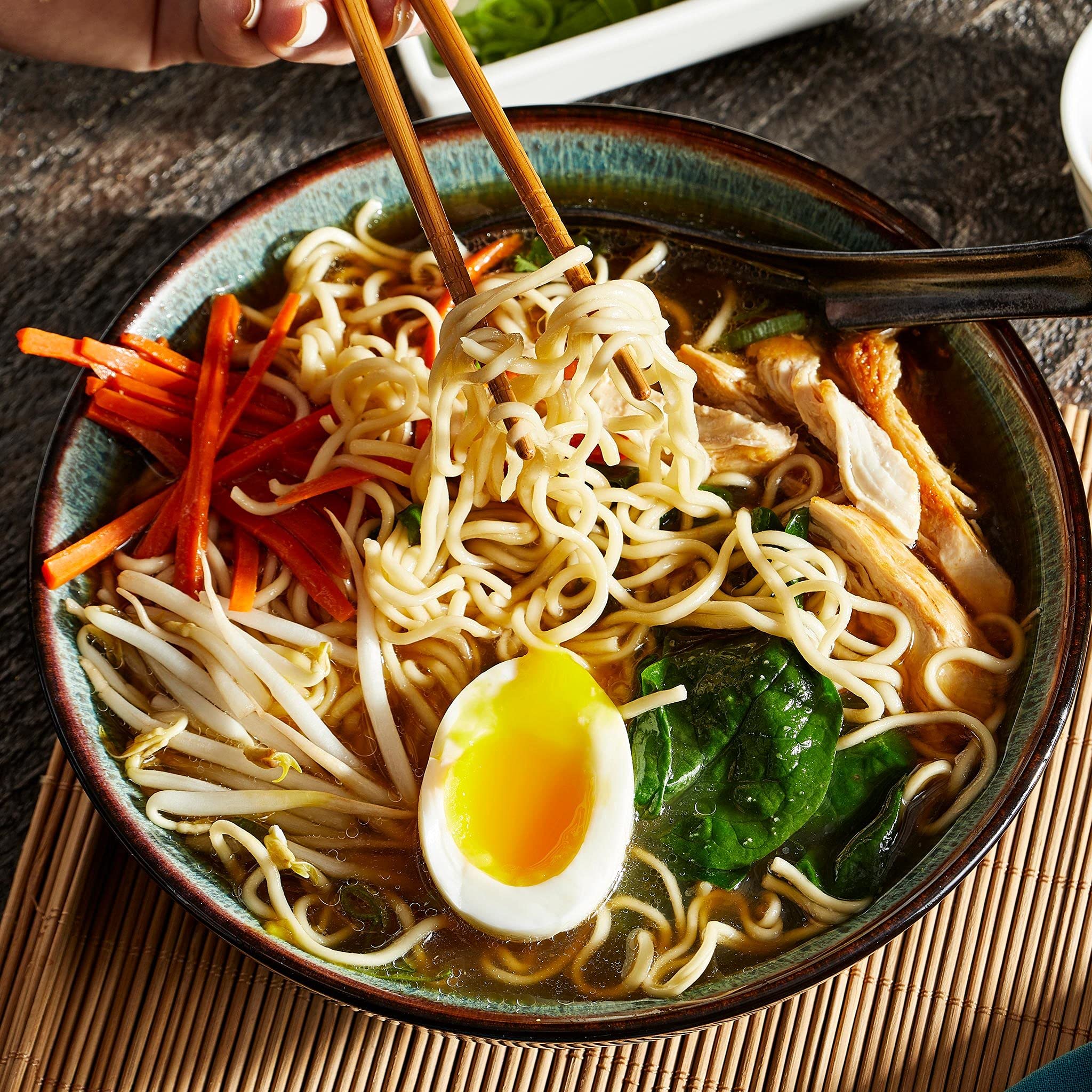 Non-GMO certification visible on Simply Asia ramen noodles packaging.