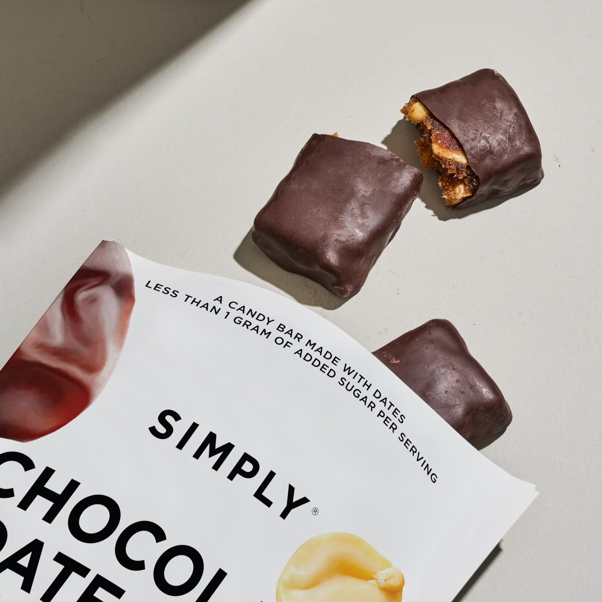 On-the-go snack moment with Simply Candy Bars in a lunch bag.