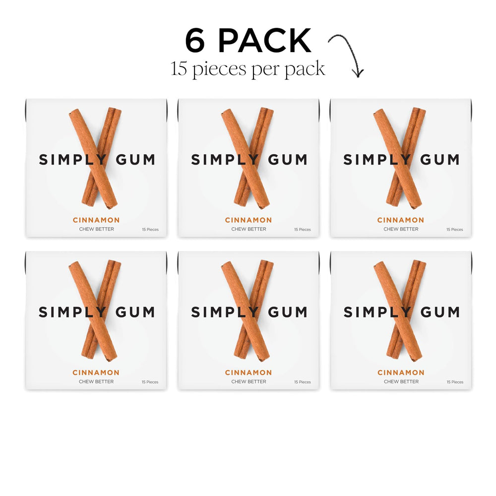 Stacked Simply Gum Cinnamon pieces demonstrate a 90-piece convenient supply.