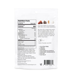 Simply Gum Salted Peanut Dark Chocolate Date Bars bar closeup highlights rich chocolate and peanut flavors.