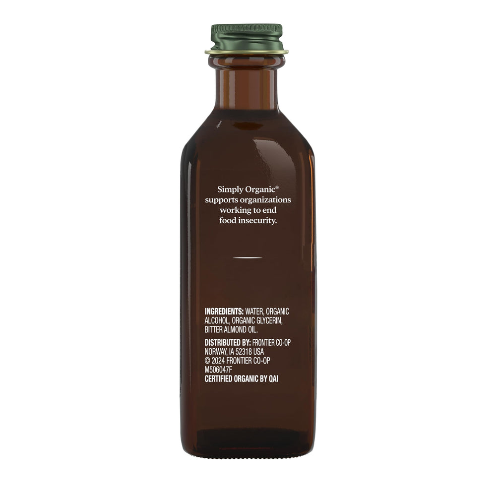 Pouring Simply Organic Almond Extract enhances beverages with a warm almond note.