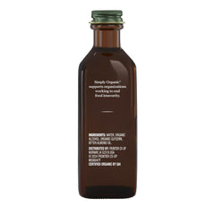 Pouring Simply Organic Almond Extract enhances beverages with a warm almond note.