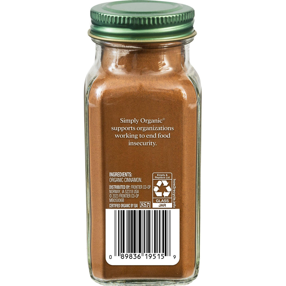 Simply Organic Ceylon cinnamon powder with spoon for sprinkling on oats.