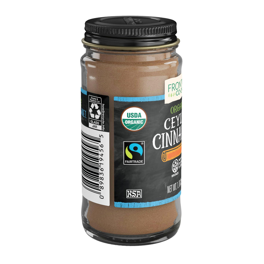 Simply Organic Frontier Cinnamon ground on a spoon for hot drinks