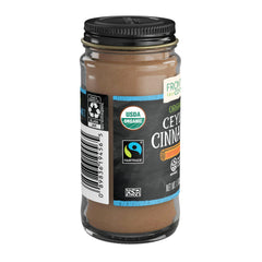 Simply Organic Frontier Cinnamon ground on a spoon for hot drinks