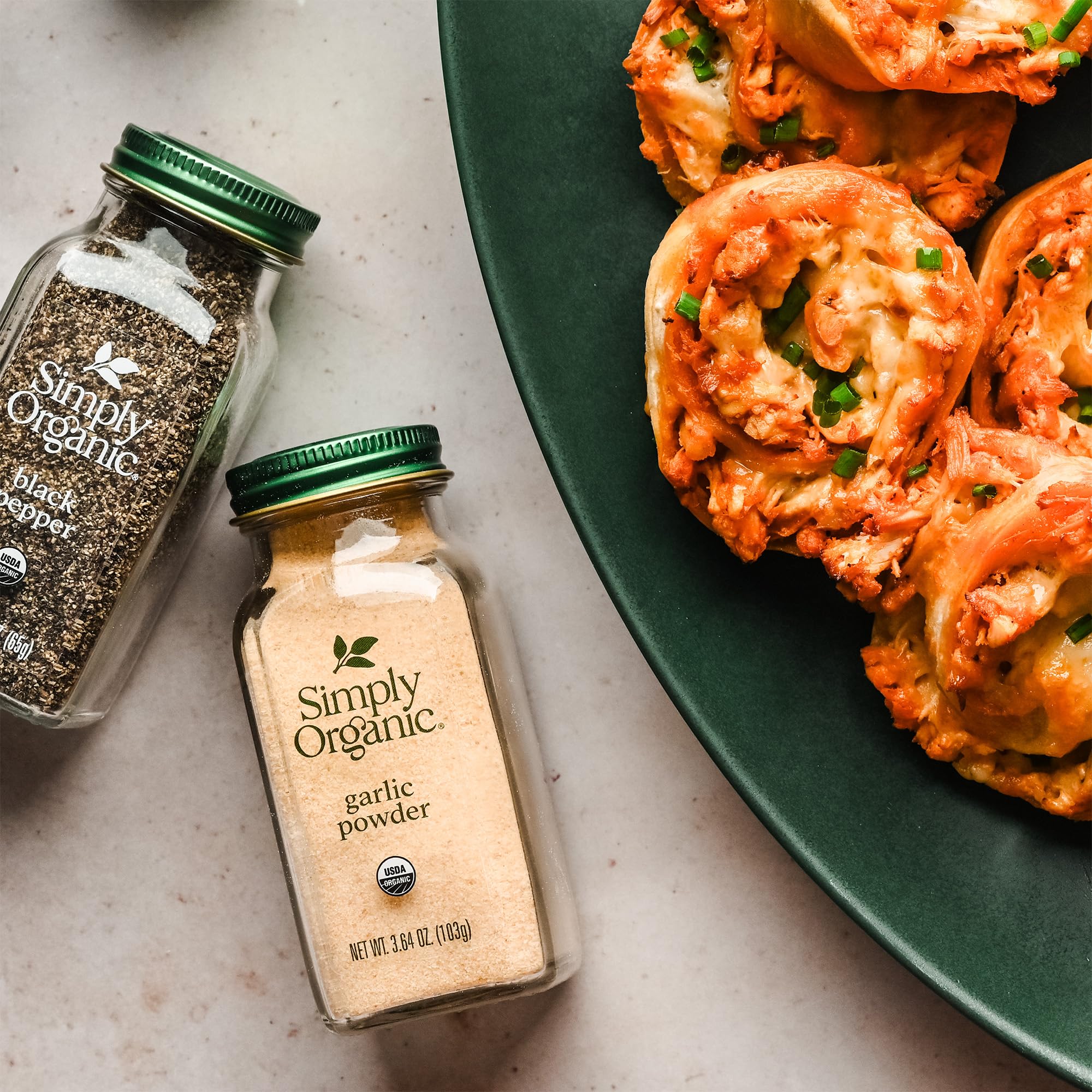 Simply Organic Garlic Powder jar labels emphasize organic, kosher, non-GMO quality.