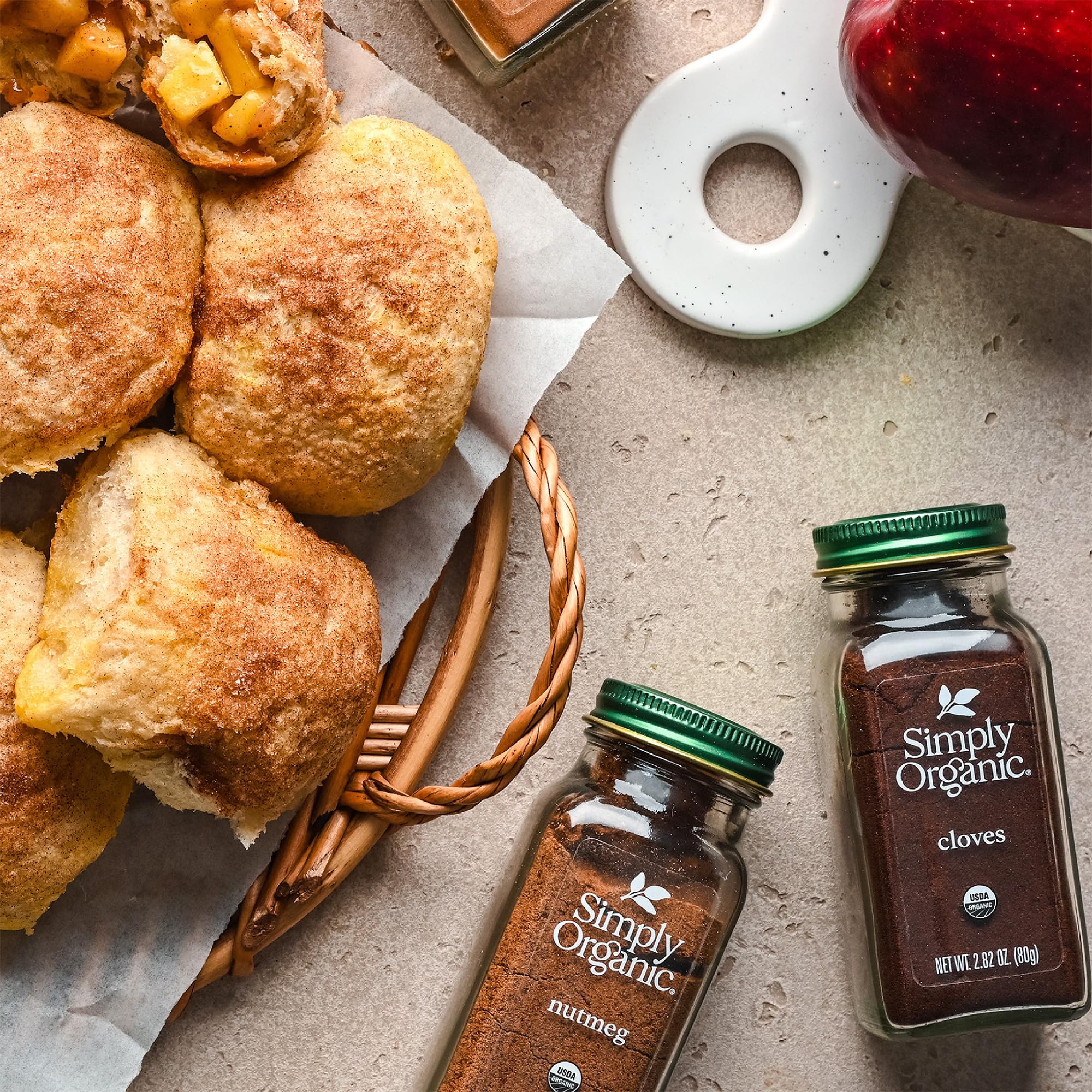 Simply Organic ground cloves in baking use image suggesting cookies and spice-rich cakes.