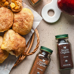 Simply Organic ground cloves in baking use image suggesting cookies and spice-rich cakes.