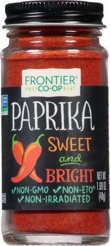 Simply Organic Ground Paprika spice dust over bowl for warm hue