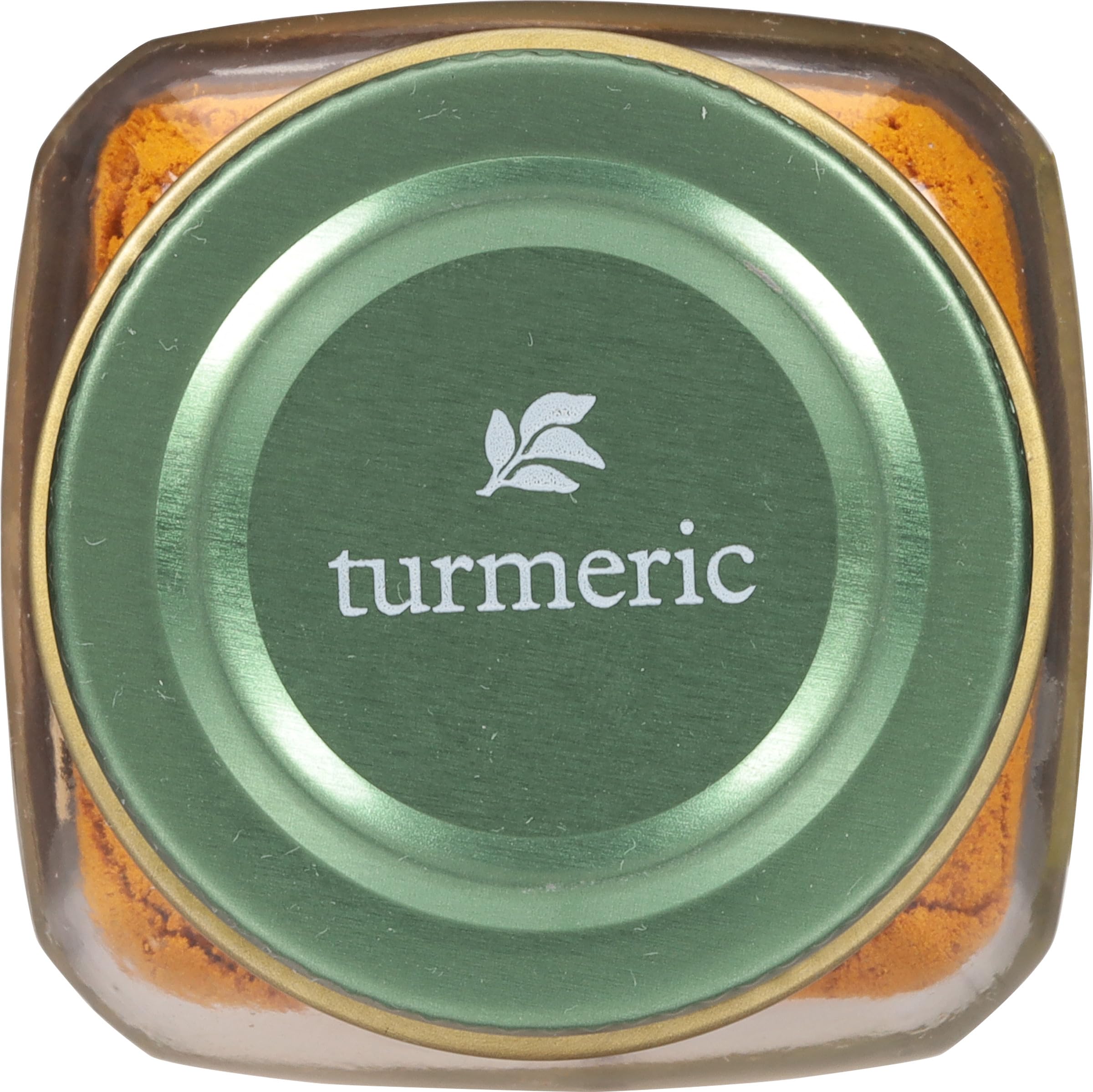 Golden turmeric powder dusting over a simmering rice dish for color and warmth.