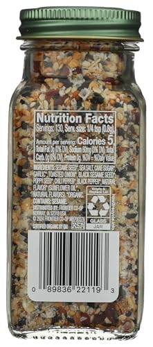 Simply Organic seasoning dusting over roasted vegetables for flavor enhancement.