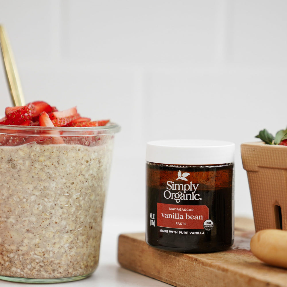 Vanilla bean paste and pods on counter for premium baking with Simply Organic