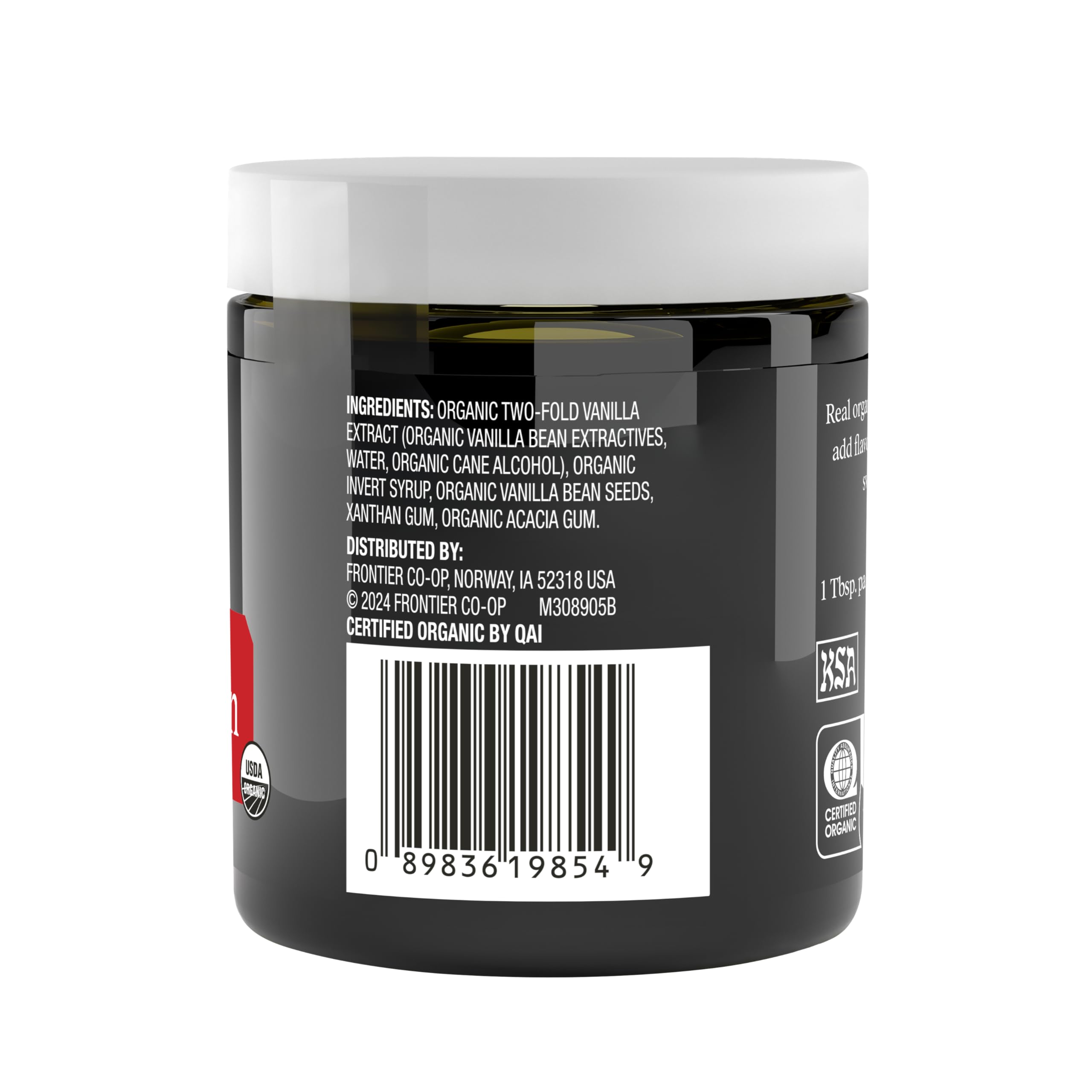 Spoonful of Simply Organic Vanilla Bean Paste showing creamy texture and aroma