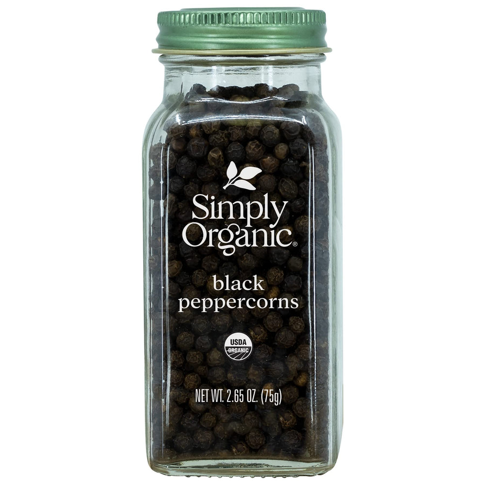 Simply Organic whole black peppercorns ready to grind for fresh, vibrant flavor.