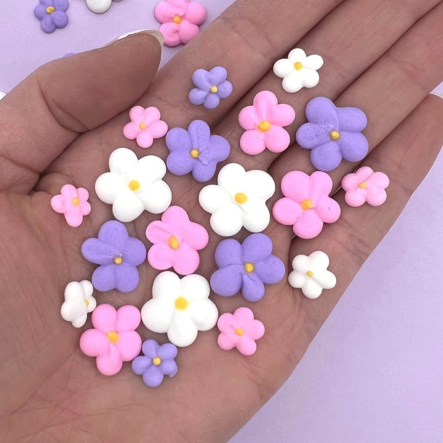 Simply Sucré Royal Icing Blossoms on cake show edible decorations for desserts.