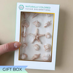 SIMPLY SUCRÉ seashell sugar decorations on cupcakes for coastal charm