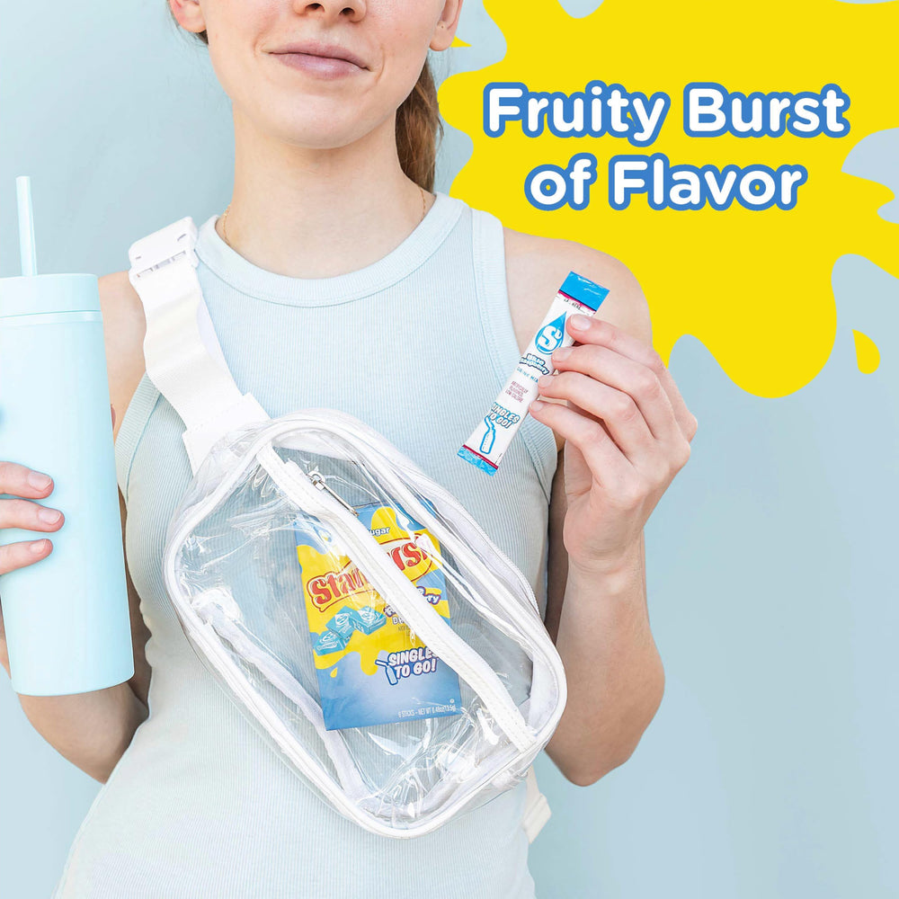 Pouring Starburst Singles To Go blue raspberry into water for a refreshing drink
