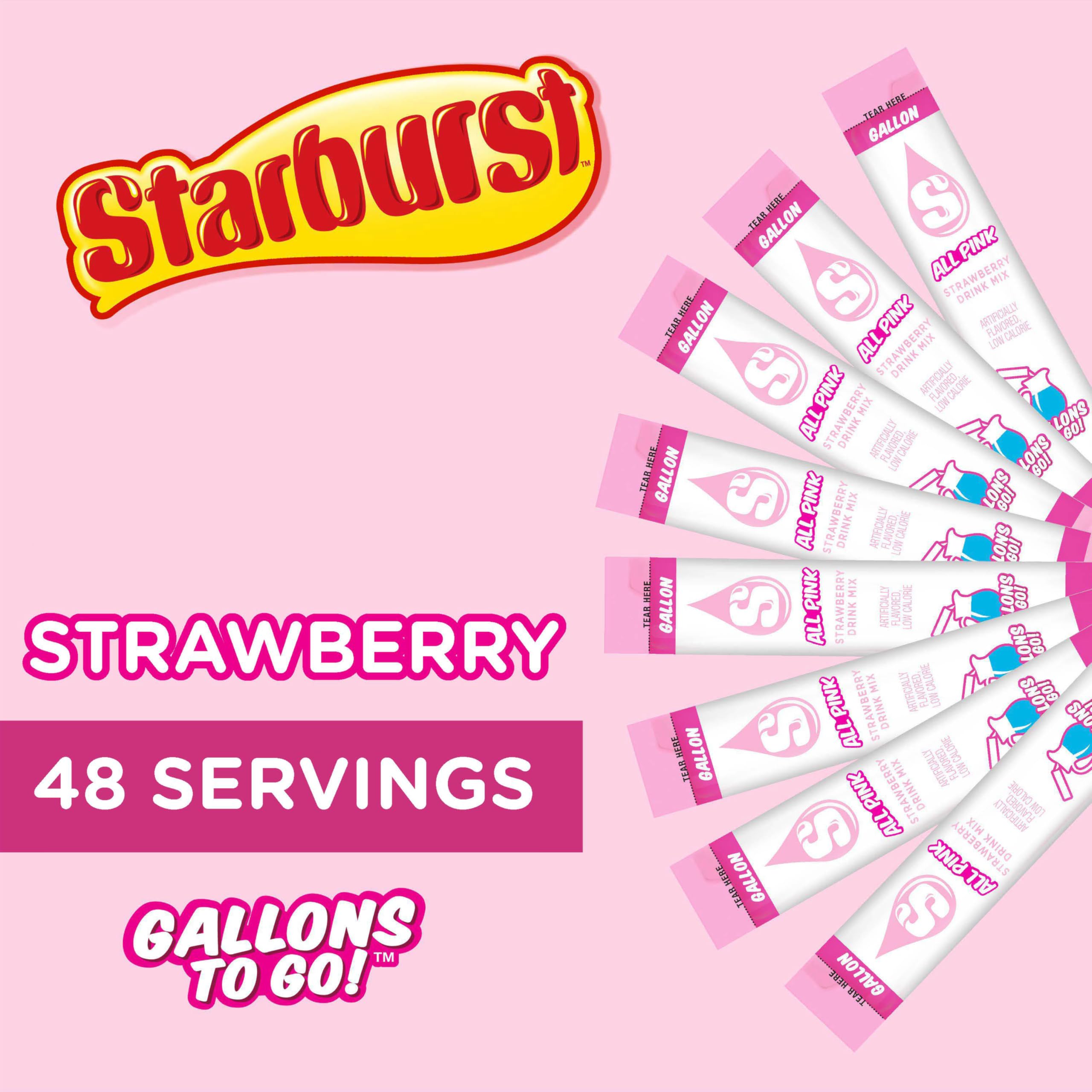 Starburst Gallons To Go box beside a pitcher, offering low-calorie flavor.