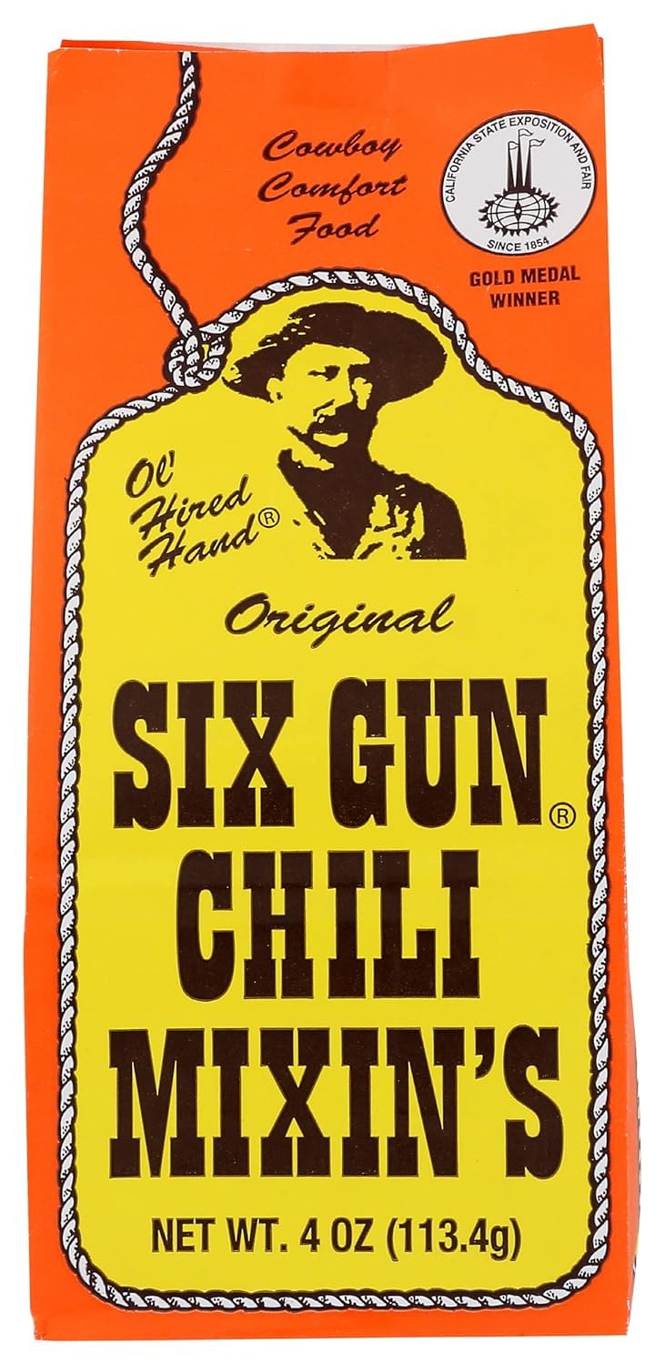 Six Gun Chili Original Mixin's chili bowl with steam and spices.