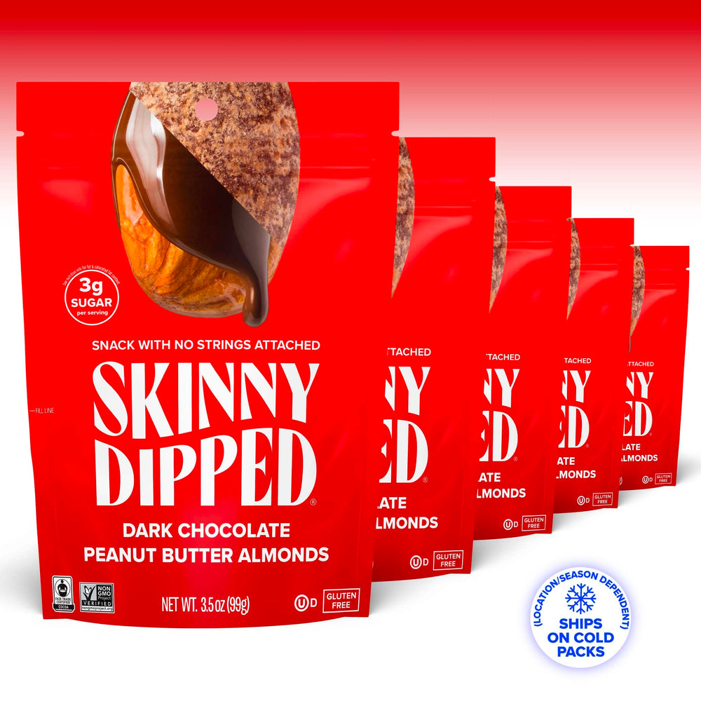 Close-up of SkinnyDipped almonds coated in chocolate and peanut butter.