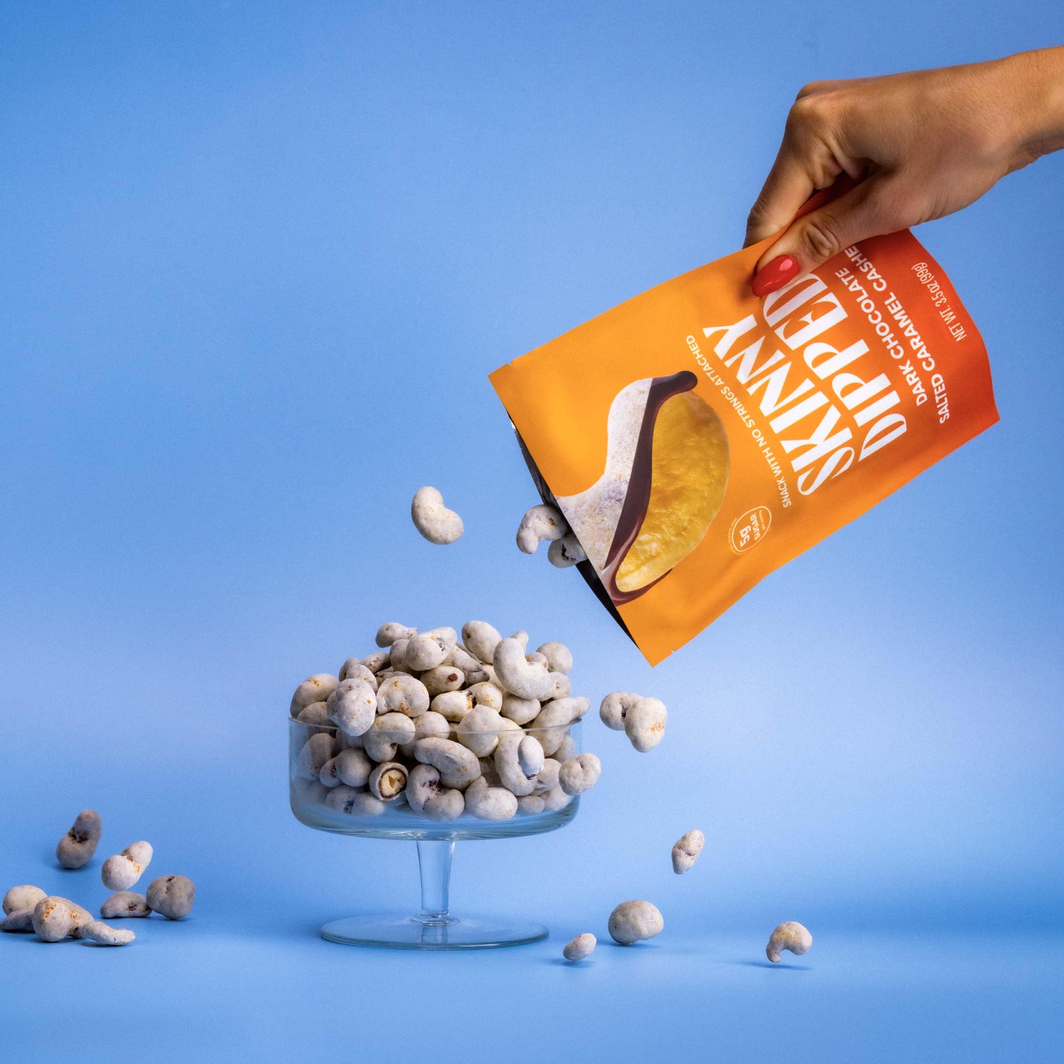 SkinnyDipped plant protein icon signals a protein-forward snack option.