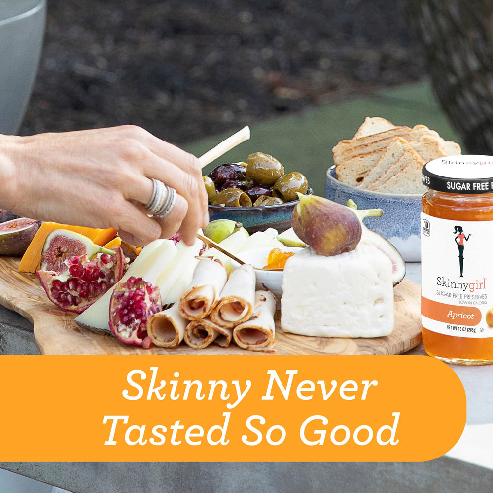 Yogurt topped with Skinnygirl Apricot Mimosa preserves for a light treat