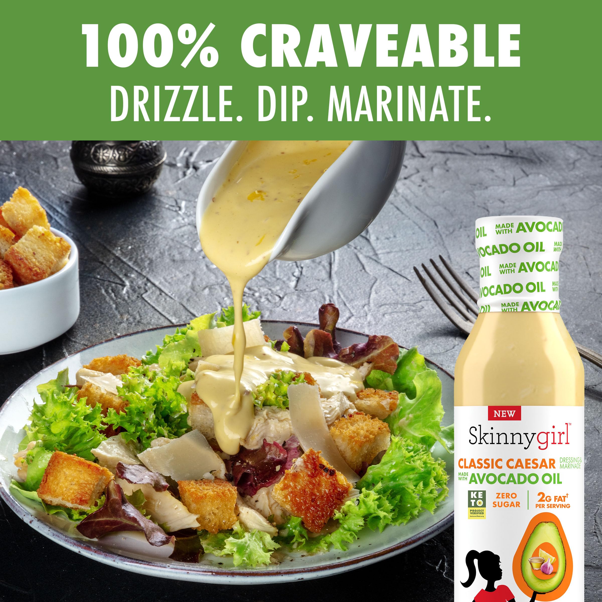 Caesar dressing drizzled on a crisp salad