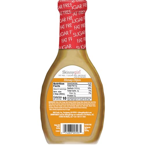 Skinnygirl Honey Dijon dressing glass bottle on a bright counter.