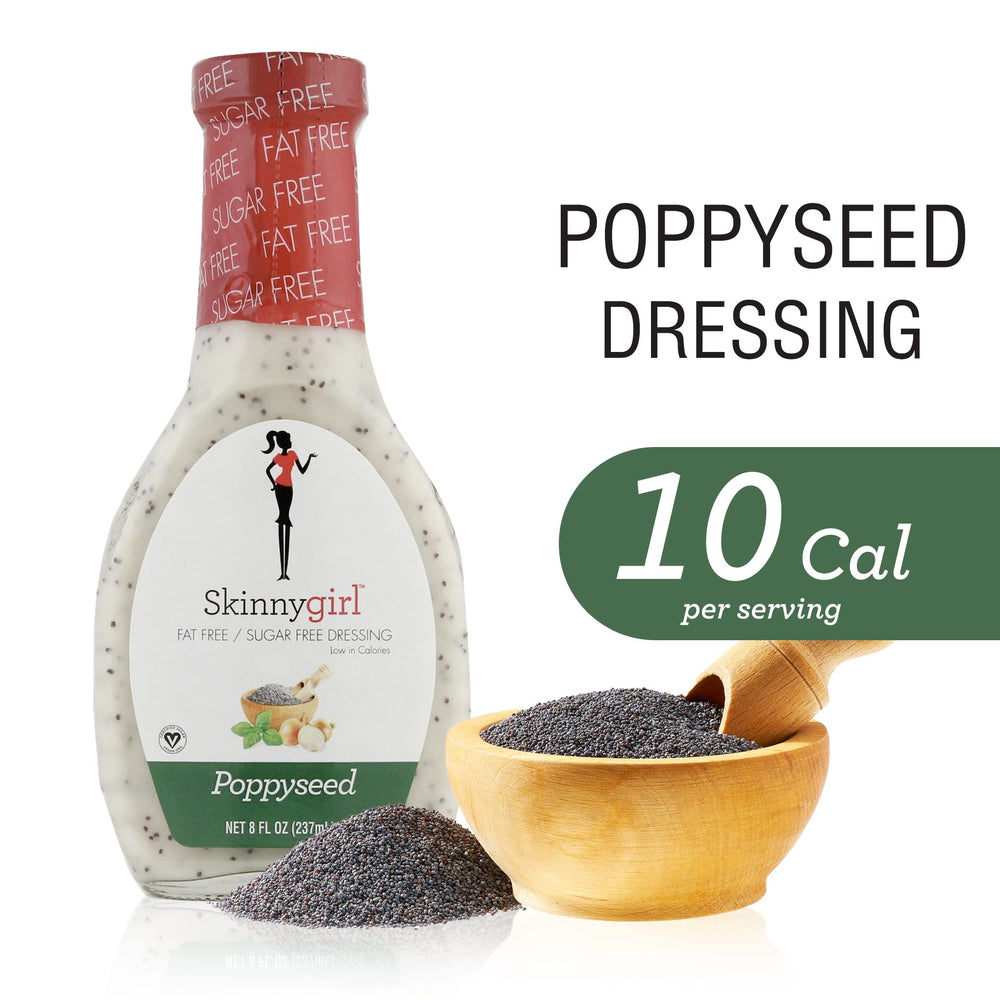 Lemon wedge beside Skinnygirl Poppyseed Dressing to suggest bright flavor.