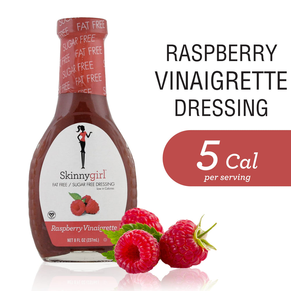 Grilled chicken salad topped with Skinnygirl Raspberry Vinaigrette adding bright flavor.