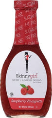 Salad bowl with raspberries featuring Skinnygirl Raspberry Vinaigrette for pairing ideas.