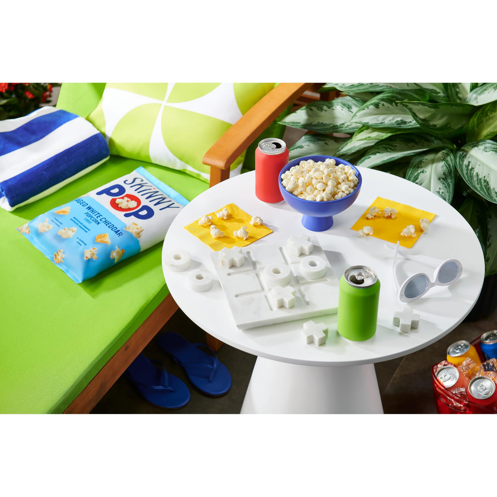 Movie night setup with SkinnyPop Aged White Cheddar for easy snacking