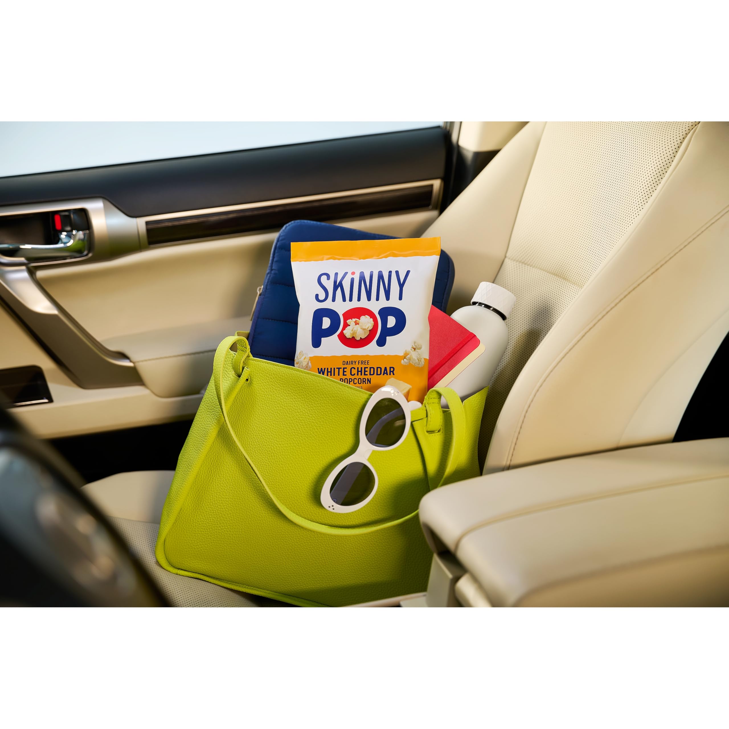 SkinnyPop dairy-free White Cheddar bag emphasizes gluten-free snacking.