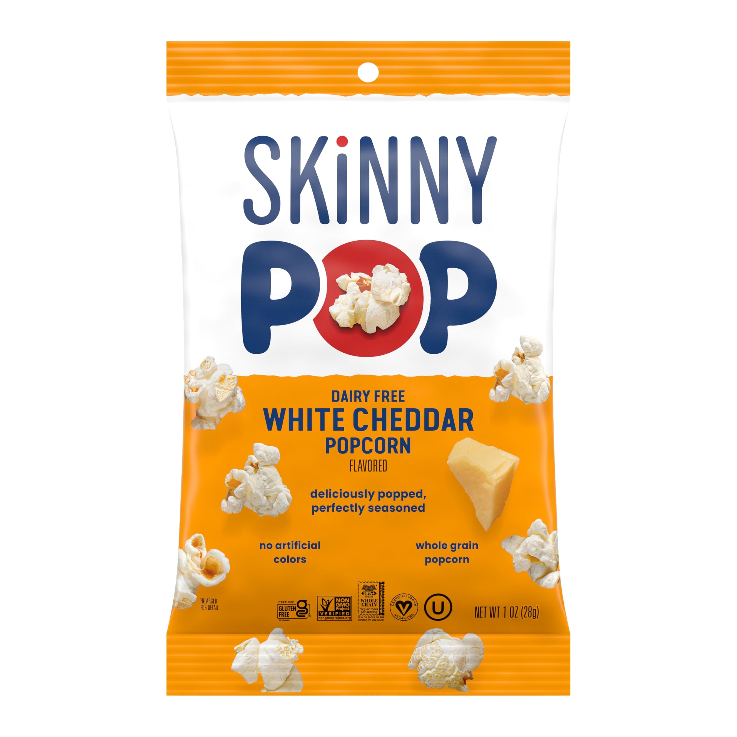 SkinnyPop on-the-go snack pack held during commute.