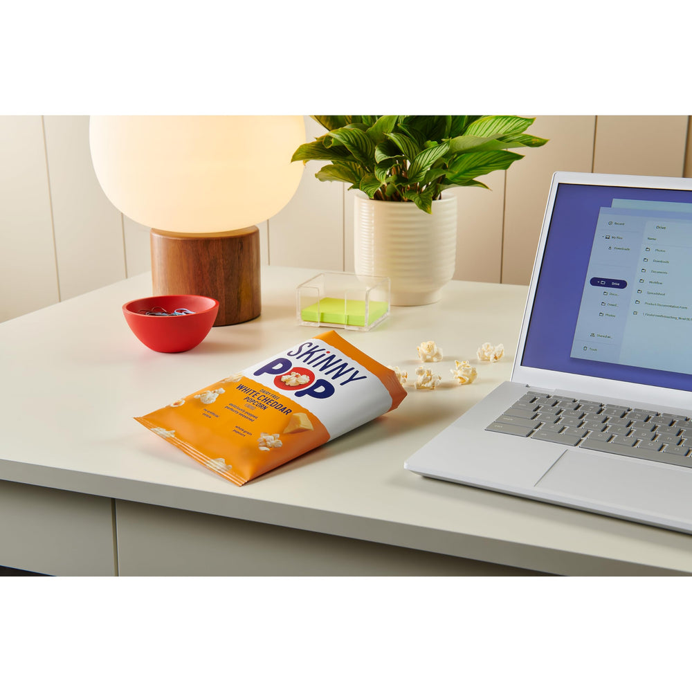 SkinnyPop White Cheddar popcorn bag shows no artificial colors