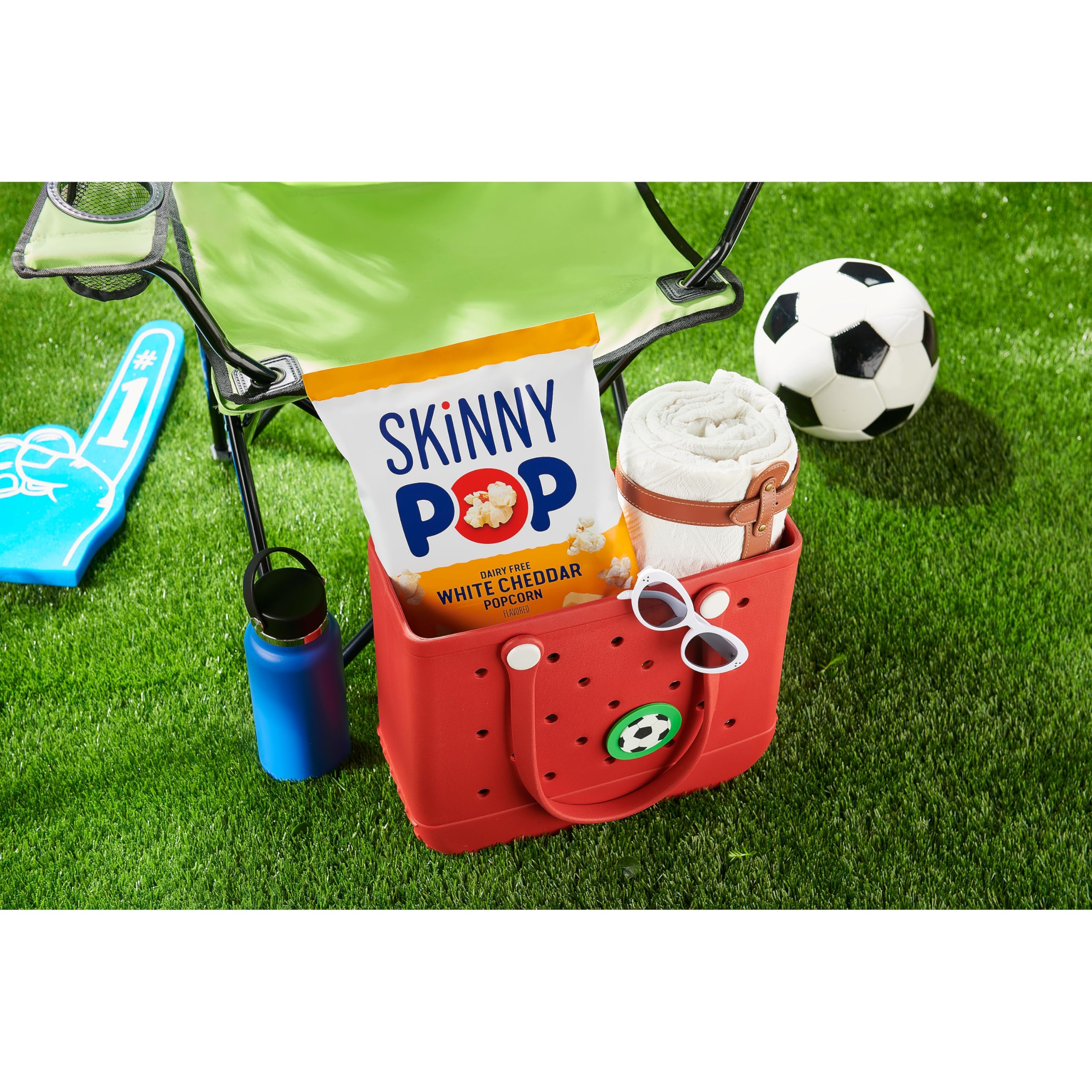 SkinnyPop White Cheddar popcorn kernels closeup highlights crispy, airy texture for snacking